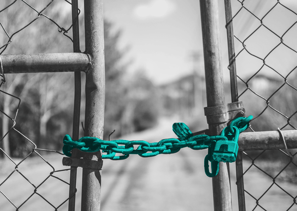 Chain holding fence together